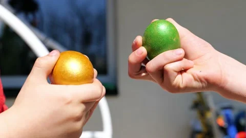 Two kind beat colorful Easter eggs outdoor Video stock 234614103