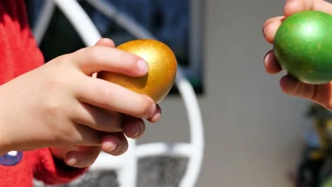 Two kind beat colorful Easter eggs outdoor 動画素材 234614163