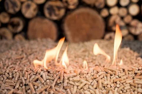 Two kind of pellets in fire Stock Photos