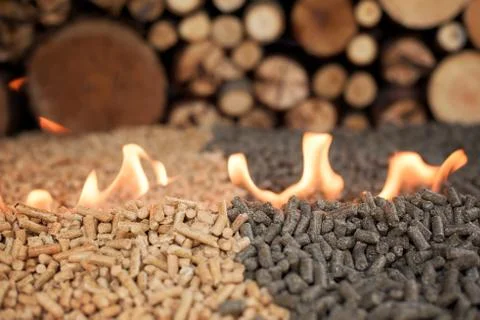 Two kind of pellets in fire Stock Photos