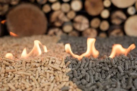 Two kind of pellets in fire Stock Photos