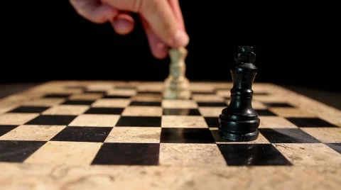 Two kings standing on a chess board, isolated on black background 스톡 동영상 58423255