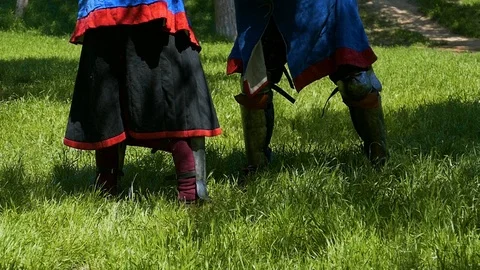 Two knights are engaged in hand-to-hand fighting. after a series of kicks, one s Stock Footage 122079884