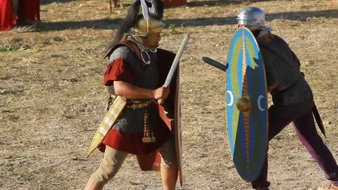 Two knights in armor preparing for battle Stock Footage 84589384