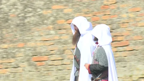 Two knights Templar wallking Stock Footage 140460556