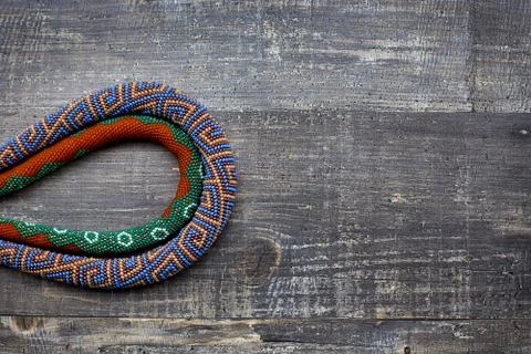 Two knitted beaded plaits Stock Photos