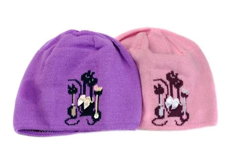 Two knitted cap with a pattern. Stock Photos