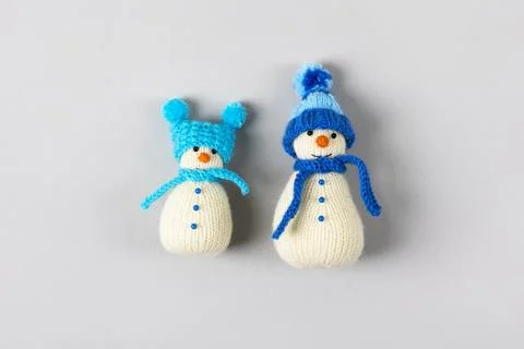 Two knitted snowmen Stock Photos