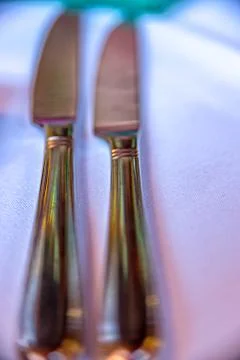 The Two knives on the table in the restaurant Stock Photos