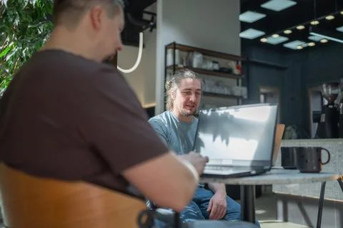 Two knowledgeable professionals collaborating effectively together in a modern Stock Photos