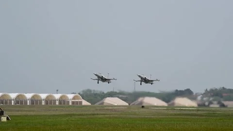 Two Korean Air Force Northrop KF-5F Jegongho aircraft taking off in tandem Stock Footage 274708231