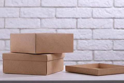 Two kraft cardboard boxes on the table Stock Photos