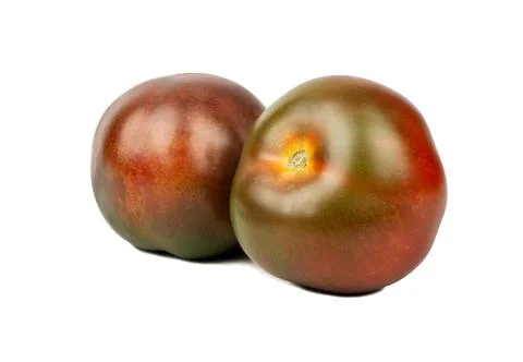 Two kumato tomatoes Stock Photos