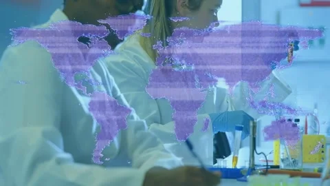 Two lab scientists pipetting sample, examining red test tube under faint purple Stock Footage 328307022