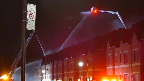Two ladders watering an house Stock Footage 90359880