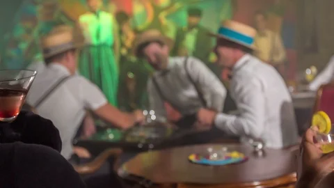 Two ladies are drinking some cocktails Stock Footage 112185075