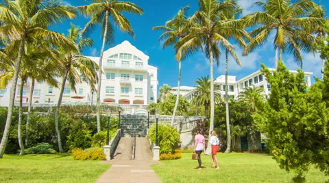 Two Ladies Walking Through Barr's Bay Park in Hamilton,Bermuda Stock Footage 36884630
