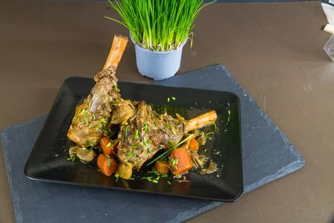 Two lamb shanks casseroled Stock Photos