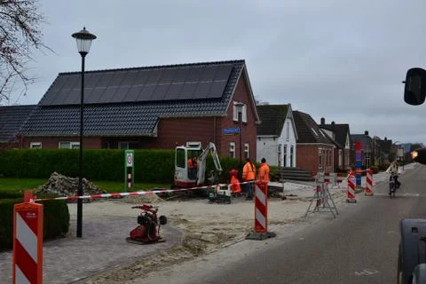 Two lampposts in the middle of a cycle path. Doezum, groningen Stock Photos