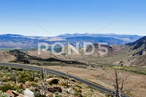 Two lane road eastern sierra nevada mountains Stock Photos