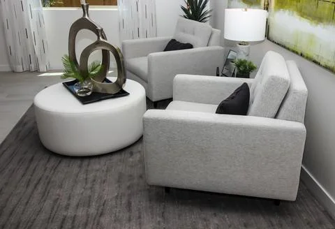 Two Large Arm Chairs &amp; Ottoman In Sitting Area Stock Photos