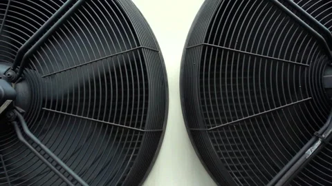 Two large industrial air conditioning condenser fans Stock Footage 134742312
