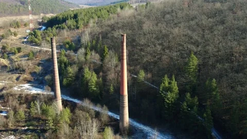 Two large non-working factory smoke pipes, a view from above, Stock Footage 170579957
