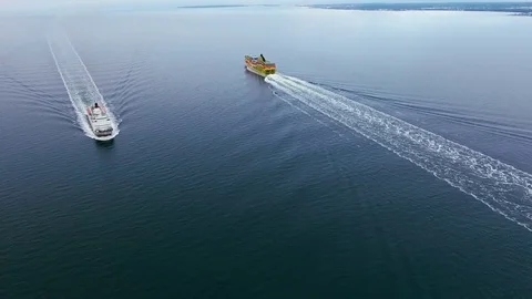 Two large passenger ferries sail in the roadstead Stock Footage 72297983