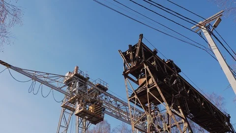 Two large railway cranes stand on the rails. Cinematic. Stock Footage 108961234