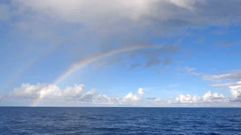 Two large rainbows in the open ocean in the Seychelles. Stock Footage 155797437