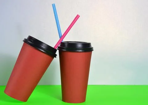 Two large red cups with straws. Stock Photos