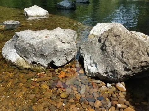 Two large rocks in a stream Stock Photos