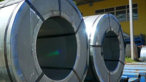 Two large rolls of tin-plate are in the warehouse of the plant  Stock Footage 119495942
