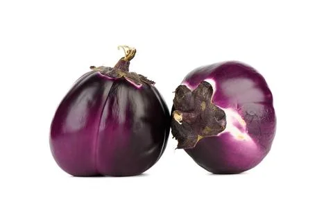 Two large spherical unpeeled eggplants on a white background. Stock-Fotos