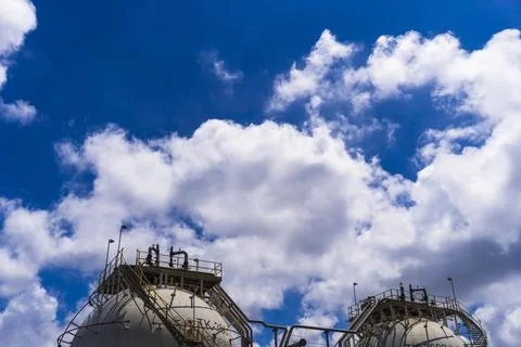 Two large tanks are on top of a building 스톡 사진
