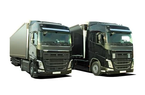 Two large trucks with a trailers Stock Photos