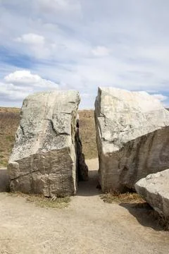 Two Large White Rocks in Field Stock Photos