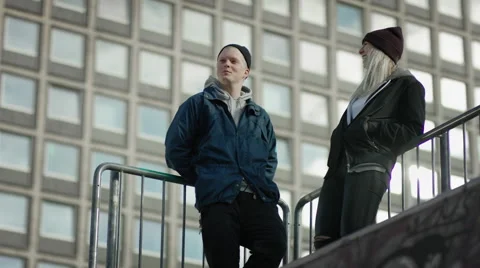 Two laughing skaters Stock Footage 61750953