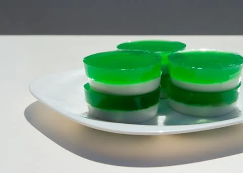 Two-layer jelly made from pandanus leaves and coconut milk. Traditional Thai Stock Photos