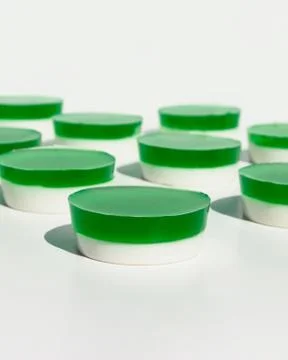 Two-layer jelly made from pandanus leaves and coconut milk. Traditional Thai Stock Photos