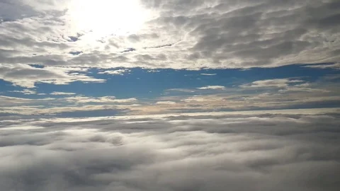Two layers of clouds, the sun on the horizon Stock Footage 93783082