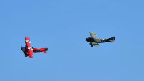 Two legendary planes fly in air at air show 스톡 동영상 196119610