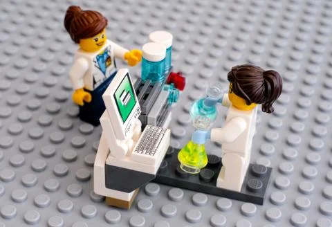 Two Lego scientists in laboratory Stock Photos
