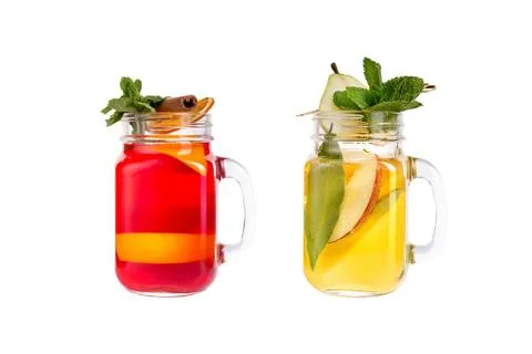 Two lemonade on a white background. A refreshing drink with a pear and a drin Stockfoto's