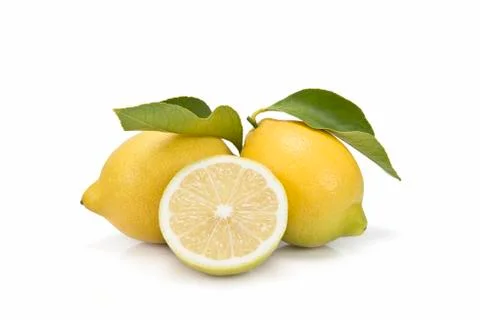 Two lemons and a half cut Stock Photos