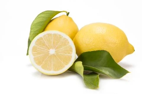 Two lemons and a half cut Stock Photos