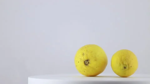 Two lemons on a white background Stock Footage 149218158