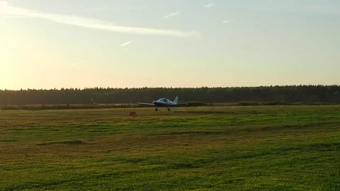 Two light aircrafts at the sunset Stock Footage 71271483