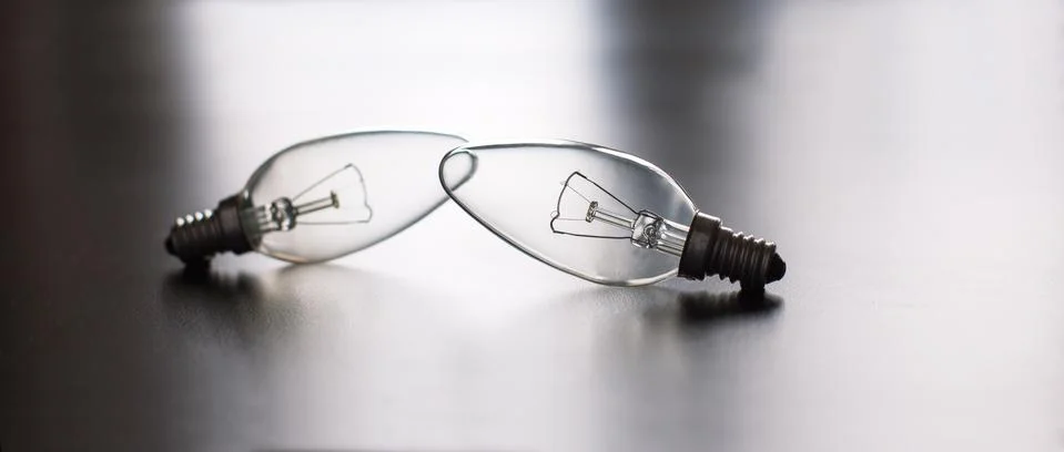 Two light bulbs Stock Photos