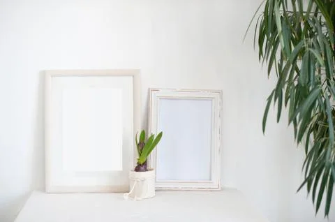Two light frames on a bedside table Stock Photos